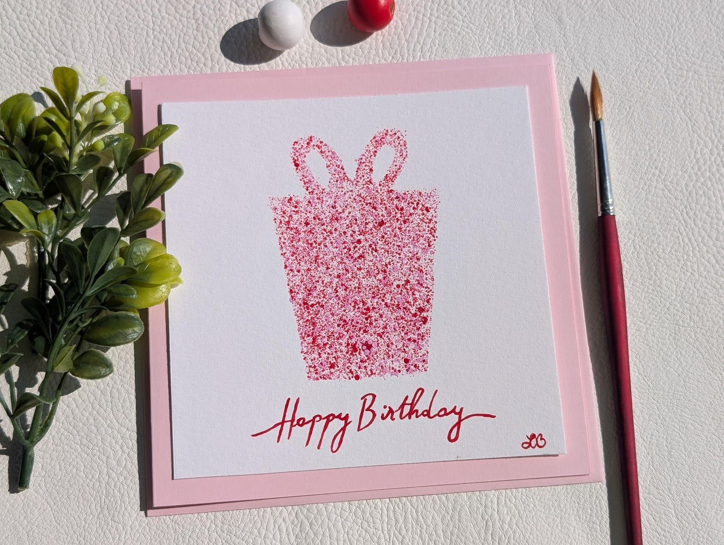 Hand-Painted Red Birthday Card: Modern Gift Box Design